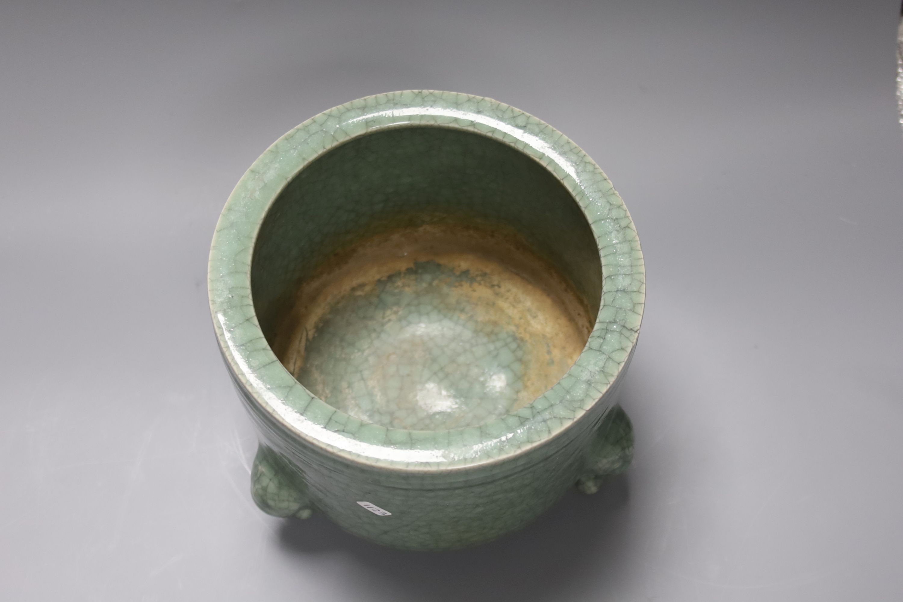A large Chinese celadon crackleglaze tripod censer 15cm